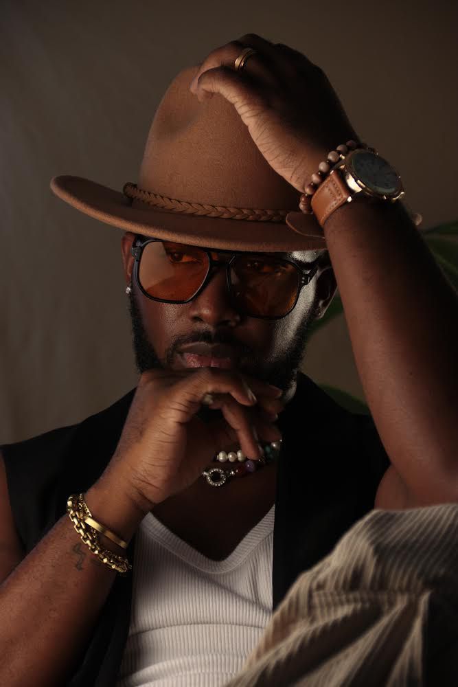 Redefining Men’s Style: Omari Husbands Blends Fashion, Barbering, and Photography